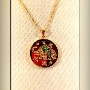 Gold tone elephant necklace by City by city